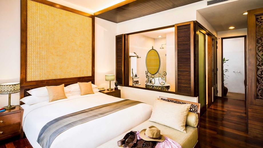 Cambodia, Siem Reap, Anantara Angkor Resort, Premier Suite Bed Bathroom