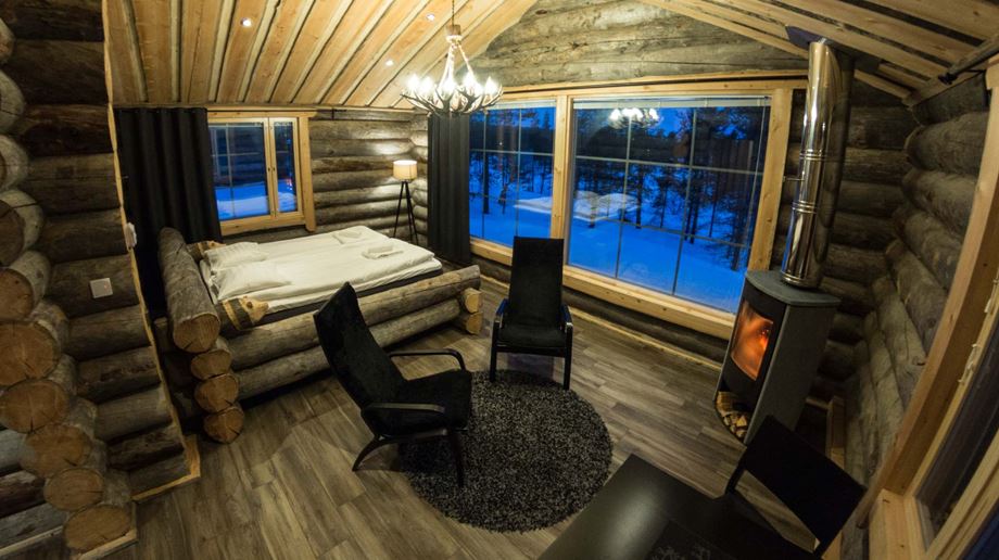 Finland, Finske Lapland, Moutka Wilderness Hotel, Panorama Log Cabin, Pejs, Vinter, Tusmørke