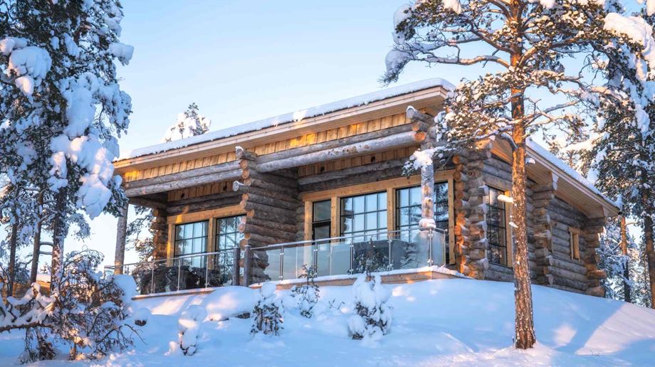 Finland Lapland Nangu Wilderness Hotel Panorama Log Cabin set udefra om vinteren
